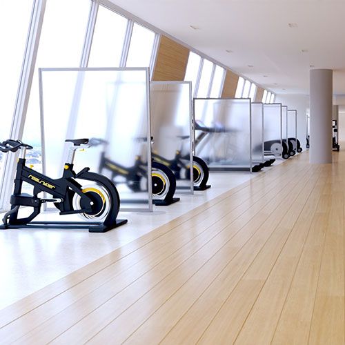 frosted acrylic protection screens used to separate gym equipment