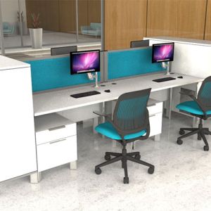 Morton+ 42mm Acoustic Desk Partitions with blue fabric and attached to the back of the desk. 